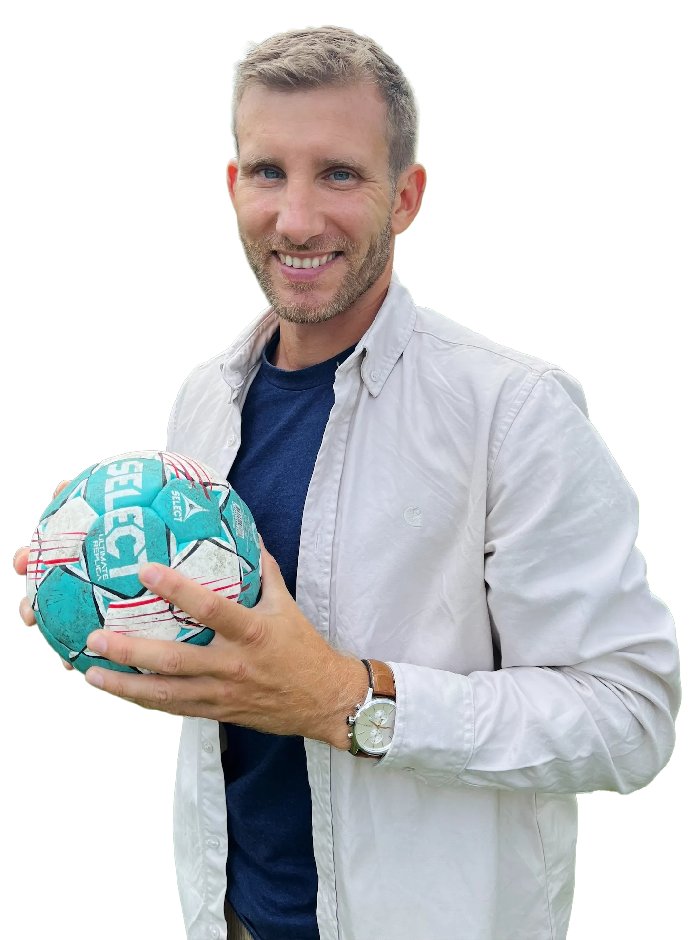 Autor Christoph Stukenbrock mit Handball in den Händen und einer weißen Jacke